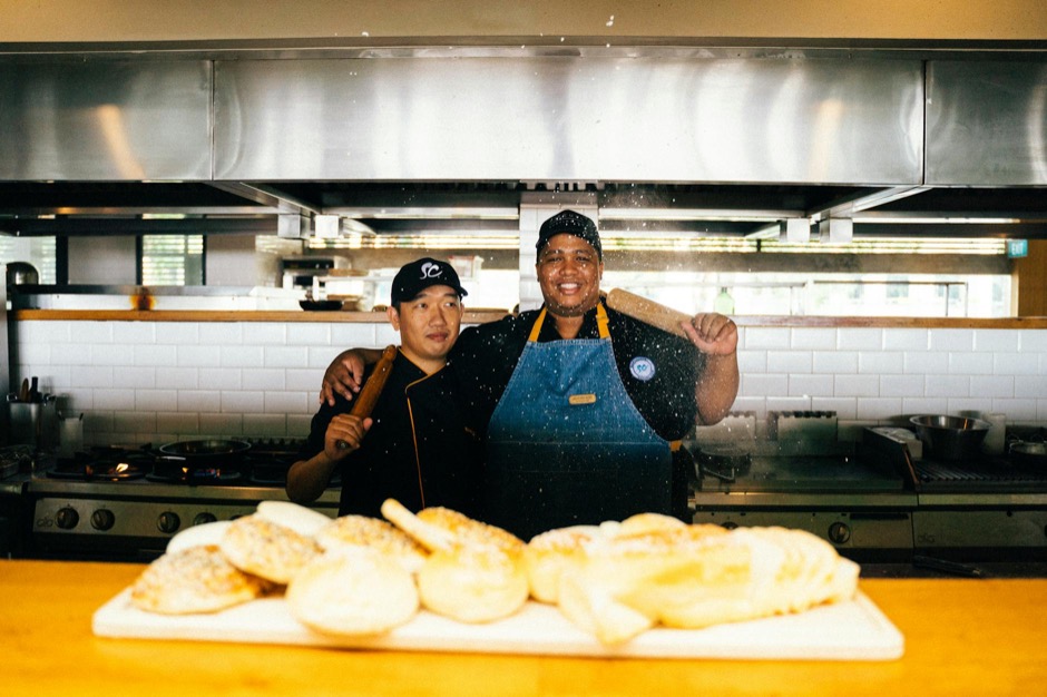 Bakers at work in a bakery kitchen